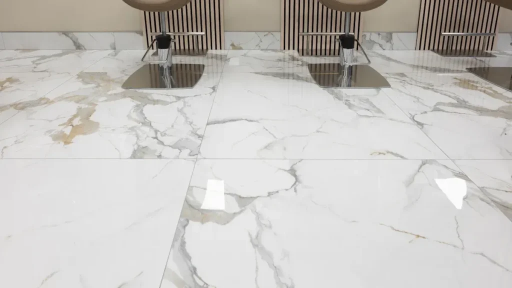 Polished white marble floor with broad gray and gold veining