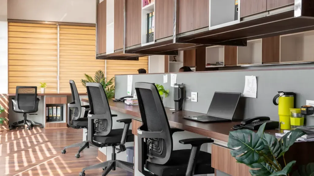 Office workstations with overhead storage cabinets