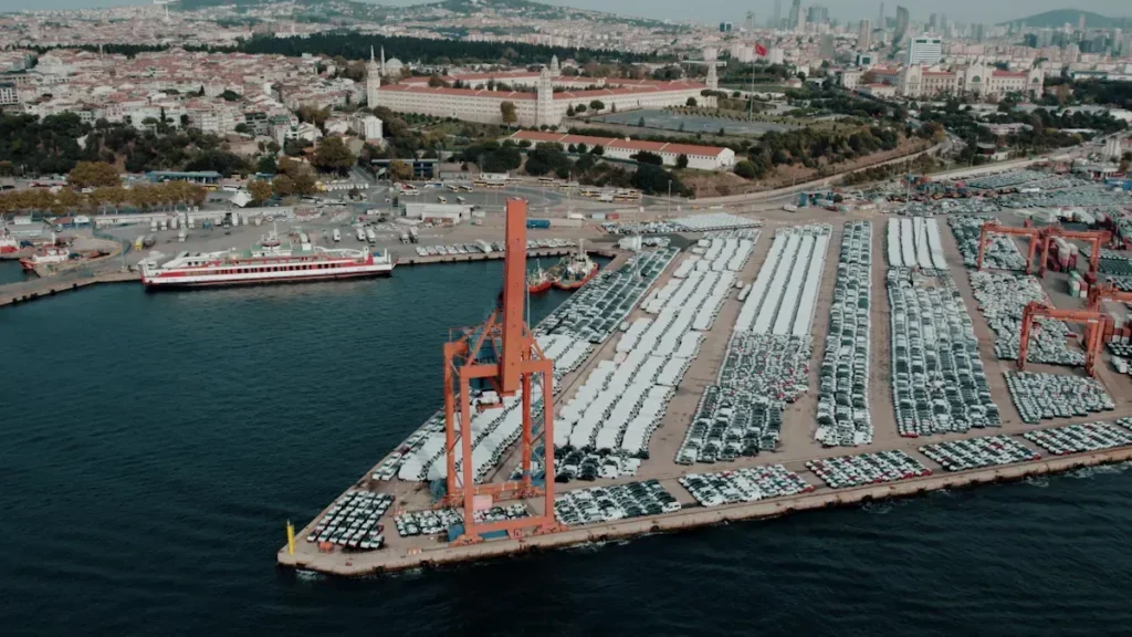Cargo port with container storage areas beside the water