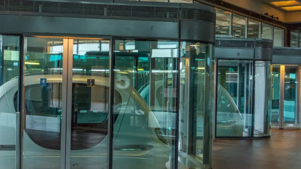 Glass entrance doors with decorative energy-label graphics