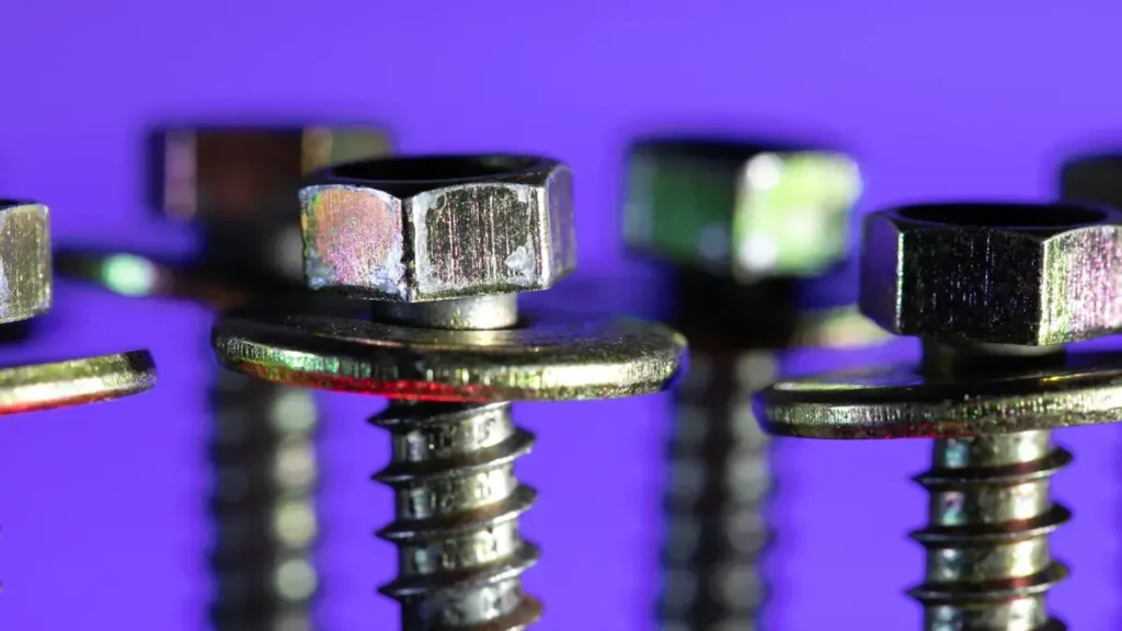 Close up of metal bolts, nuts and washers