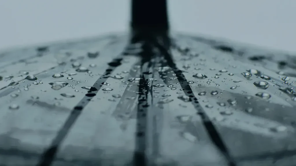 Water droplets on a dark surface