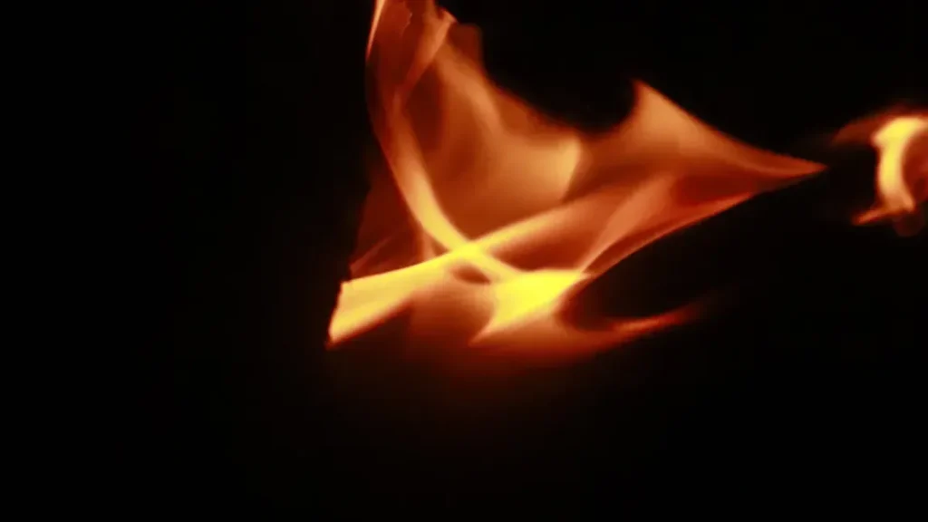 Close up of flames against a dark background