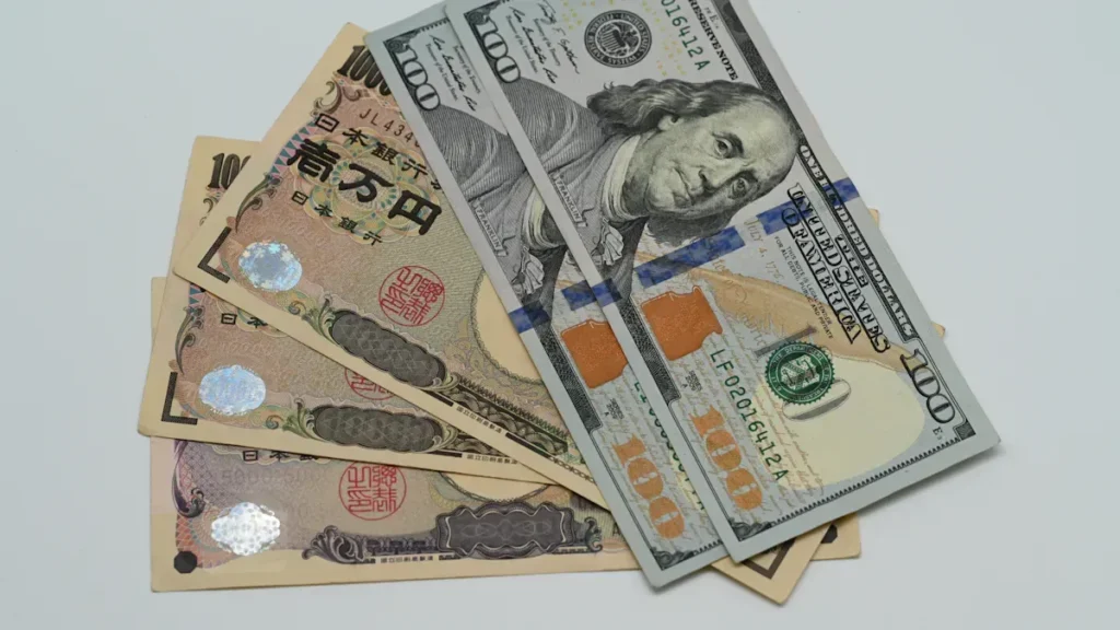 US dollar and Japanese yen banknotes
