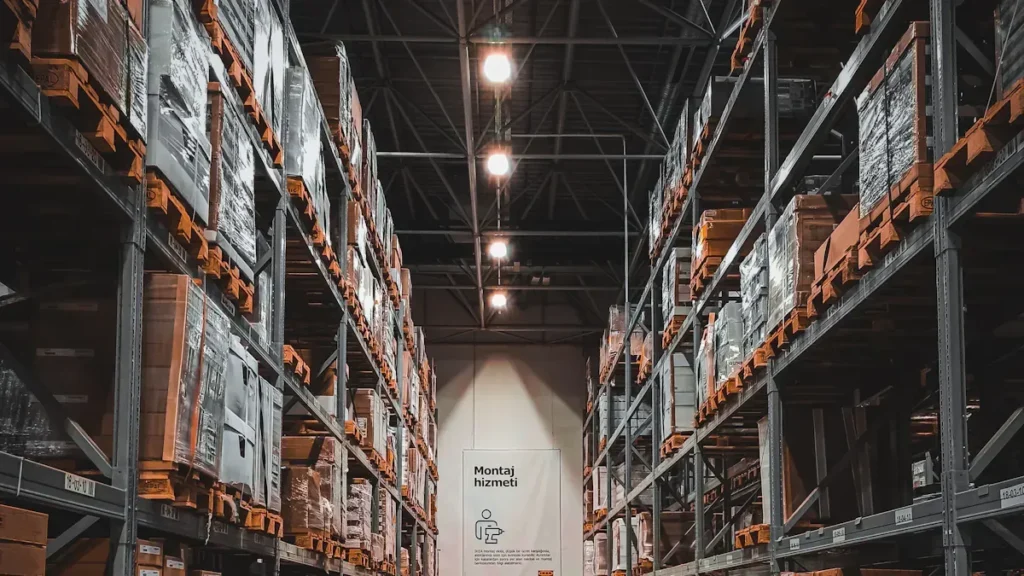 Warehouse aisle with pallets stored on tall racks