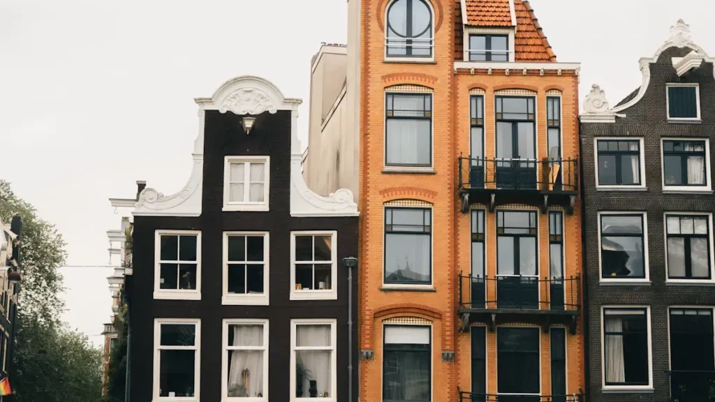 Narrow multi story houses with tall windows