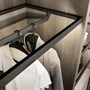 Pull-out clothes rail inside a wardrobe