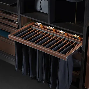 Pull-out trouser rack inside a wardrobe